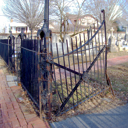 Damaged wrought iron gate before restoration
