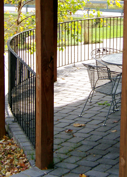 Artist-blacksmith curved deck railing